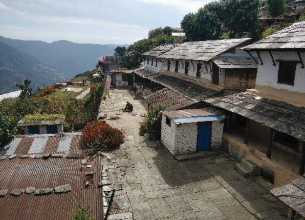 Houses of stone. Yes, 2,500 kilometers apart, the smart mountain folks in Sichuan and Nepal solved the problem of scarce building materials the same way.